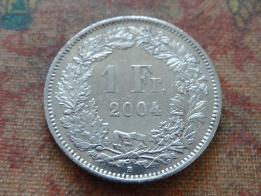 Tutti le monete: 1 Fr. 2004 – Usato da Romanel-sur-Lausanne venduto da Swift13