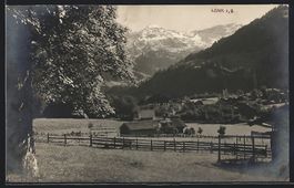 Lenk i. S., Ortsansicht mit Bergen von e