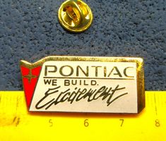 PONTIAC AUTO LOGO PIN WE BUILD ENAMEL GOLDIG