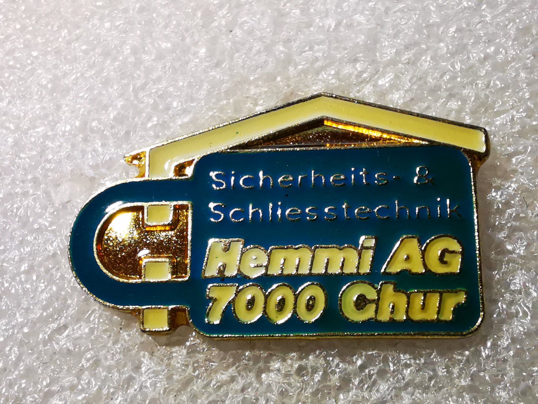 Placchette & Badge: Ansteckpin 27: Hemmi AG Chur – Usato da Oppligen venduto da Pin-Fall-Shop