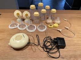 Medela Mini Electric Milchpumpe mit Zubehör zu verkaufen!