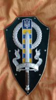 Ein Ukrainischen Grenzpfosten mit Schwert im Schildform