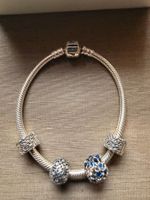 Pandora Armband mit vier Charms nie getragen
