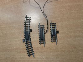 2 Minitrix Anschlussgleise / 1 Minitrix Kontaktgleis