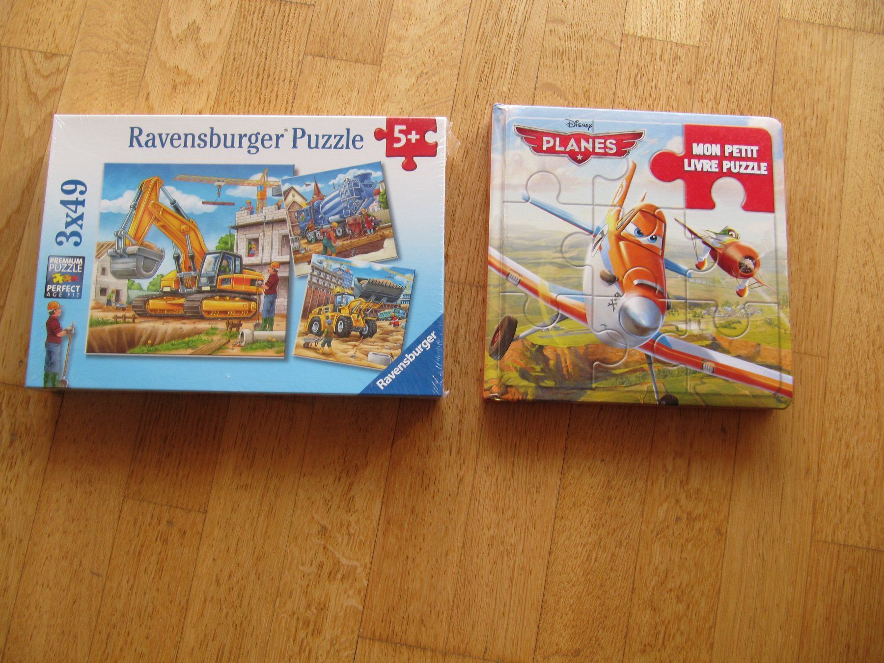 Ravensburger Puzzle: 2 x Puzzlen: Puzzlebuch planes = 4 Puzzle + Ravensburger Bau – Nuovo (secondo la descrizione) da Würenlos venduto da AustralisZ