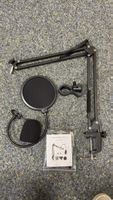 Adjustable microphone stand with pop filter
