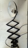 Schwarze Wandlampe von Christian Dell/ Allumag Belmag AG