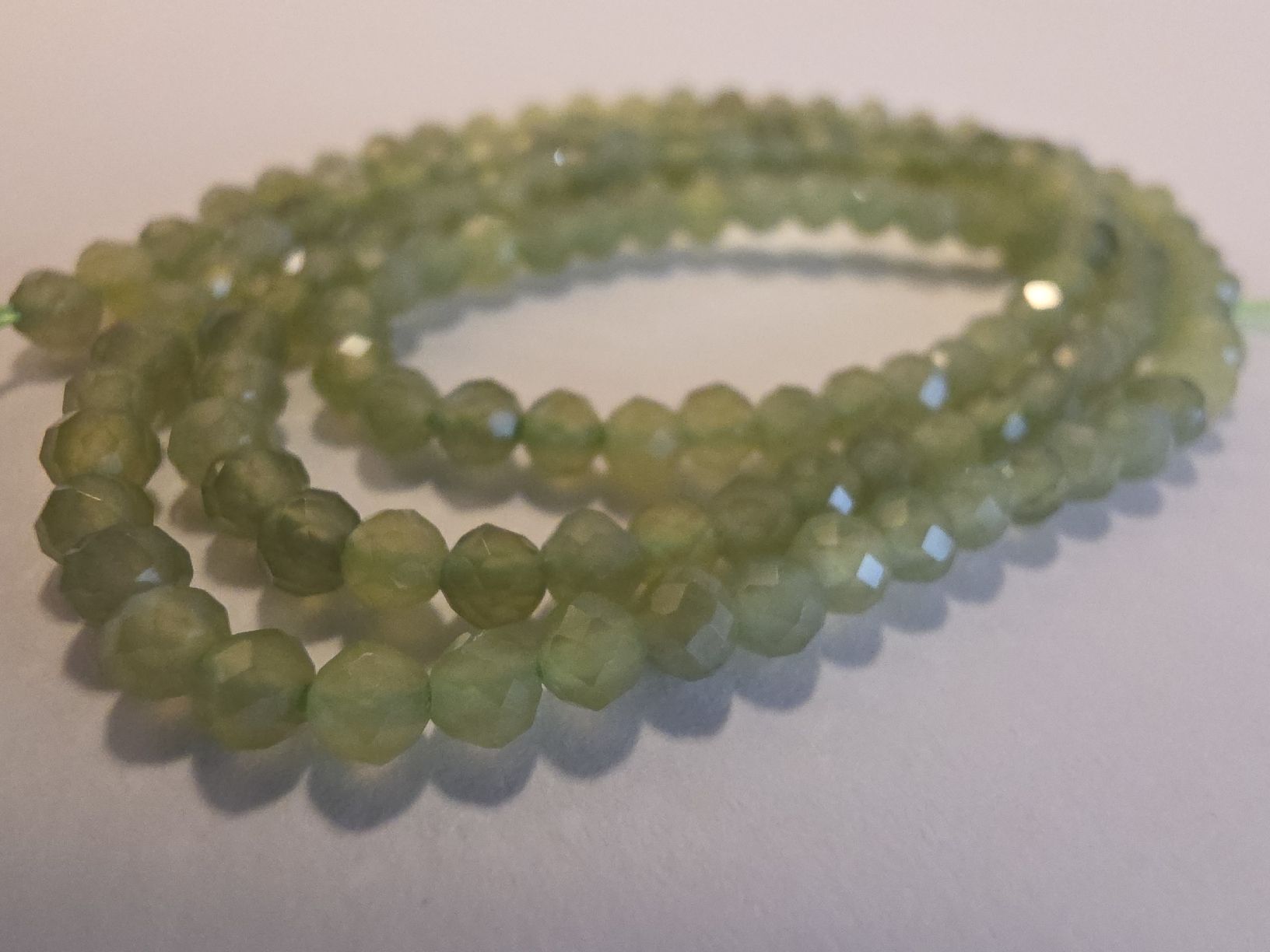 Minerali & Pietre curative: Peridot facettiert 3mm. Strang – Nuovo e nell'imballaggio originale da Menziken venduto da Mirager