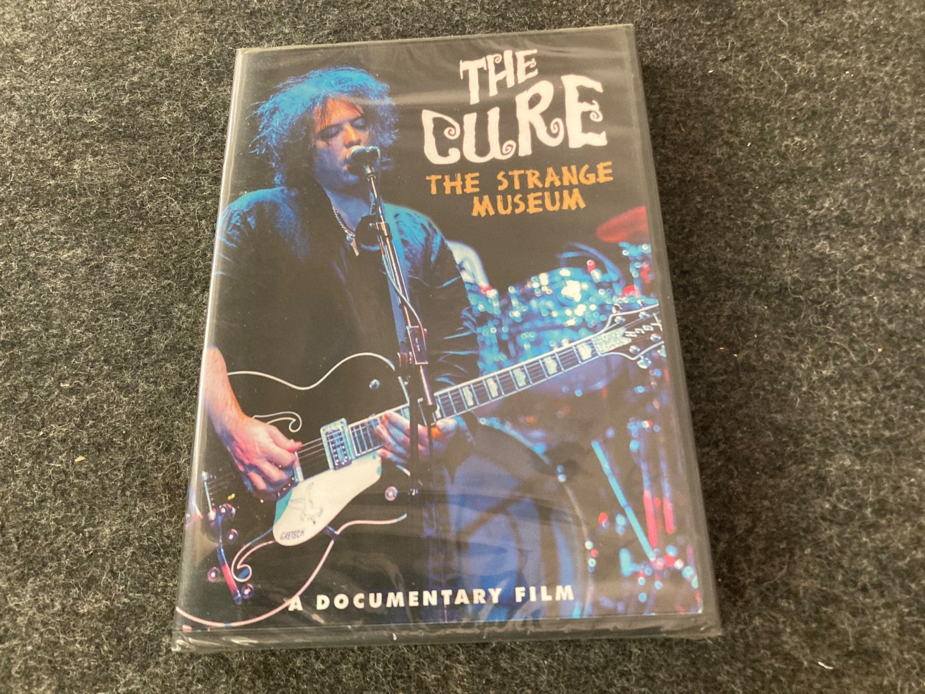 Alle DVDs: The Cure - The Strange Museum – Neu und originalverpackt aus Fribourg von Karushi