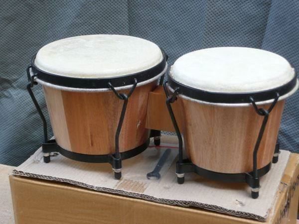 Musikinstrumente: Bongo - Holzkessel - Naturfelle – Neu und originalverpackt aus Davos-Platz von musikhauskollegger 1