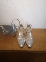 Damenschuh mit Handtasche