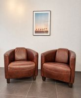 Zwei braune Ledersessel im Loft-Style