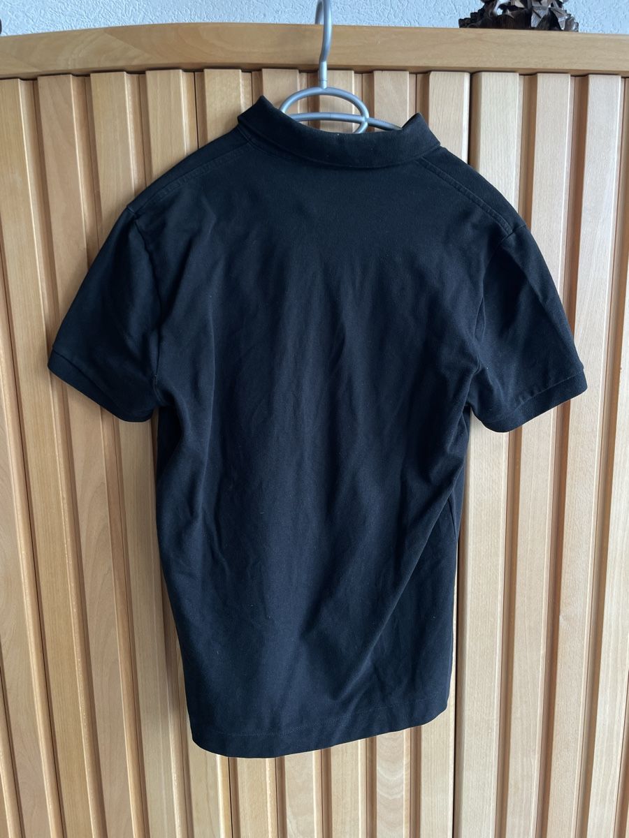 Lacoste Magliette Polo: Lacoste - full black polo - Excellent condition – Usato da Onnens VD venduto da Slyce 1