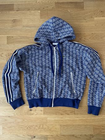 Veste à capuche Lacoste bleu motif géométrique état neuf