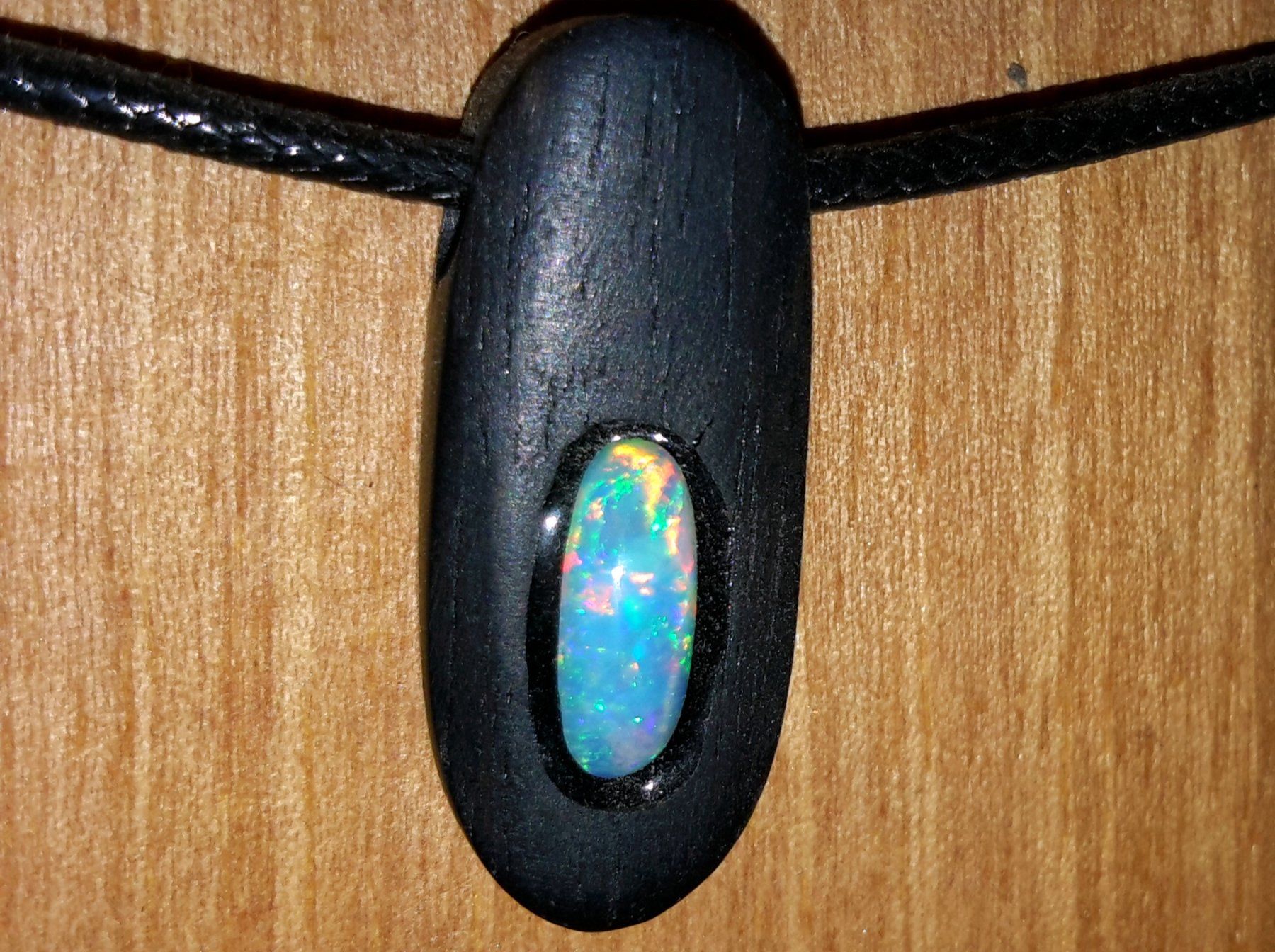 Pietre preziose: Australischer Multicolor Flashfire Kristall Opal im Ebenholz – Nuovo e nell'imballaggio originale da Uerkheim venduto da Winwinner 4