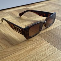 Damen Goldene D Logo Sonnenbrille