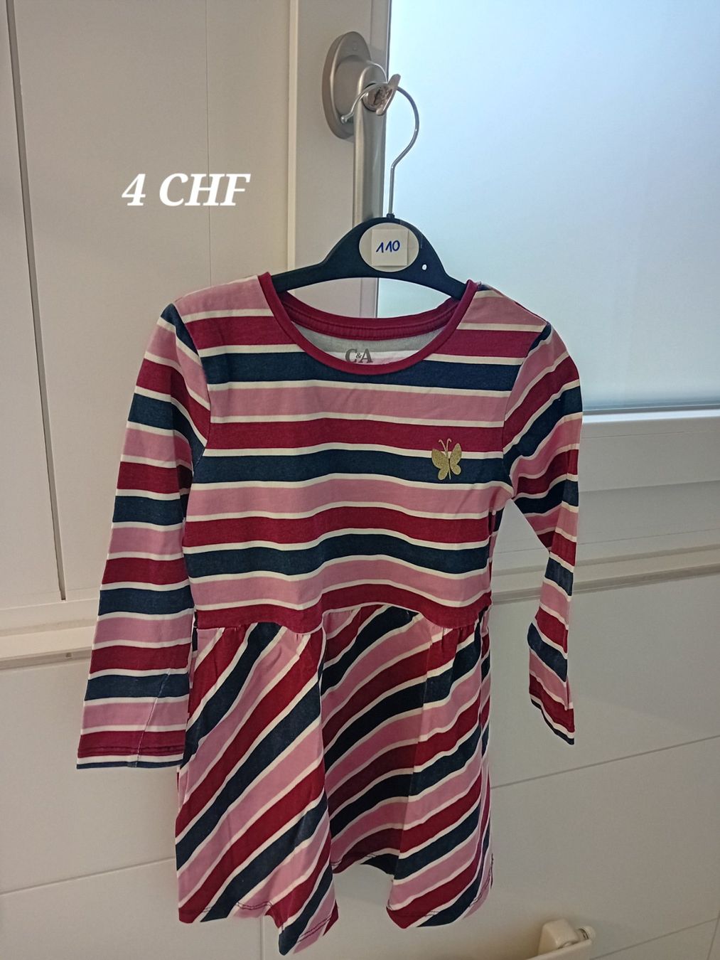 C&A Robes et jupes: Kleid Mädchen Langarm 110 – D'occasion à Romanshorn par cojbamil