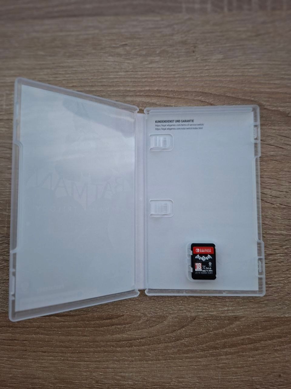 Nintendo Spiele: Batman Arkham Trilogy – Neu (gemäss Beschreibung) aus Lyss von realstyle 1