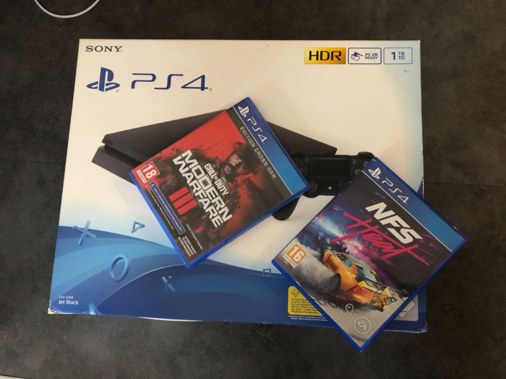 Sony PS4 Slim 1TB new, unused + NFS Heat + COD MF III 1