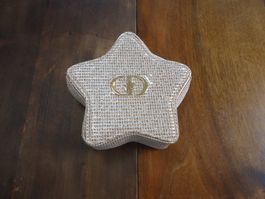Petite trousse de maquillage Dior en forme d'étoile