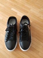 Baskets noires avec fermeture éclair dorée, taille 36