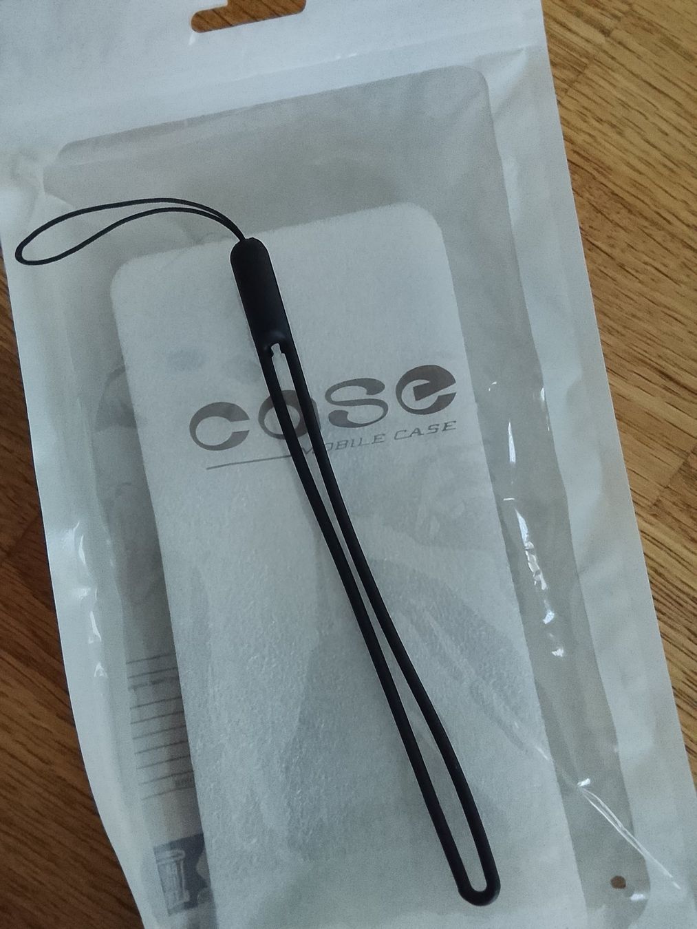Cover & Protezioni schermo: Bracelet/attache pour coque smartphone, NEUF – Nuovo e nell'imballaggio originale da Le Mont-sur-Lausanne venduto da picachu1052