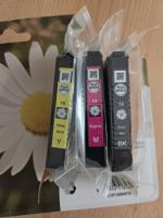 Cartouches d'encre Epson Jaune,magenta, noir. Voir photos 