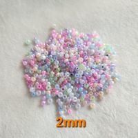 10g pastellfarbene glänzende Ceylon Glas-Rocailles 2mm