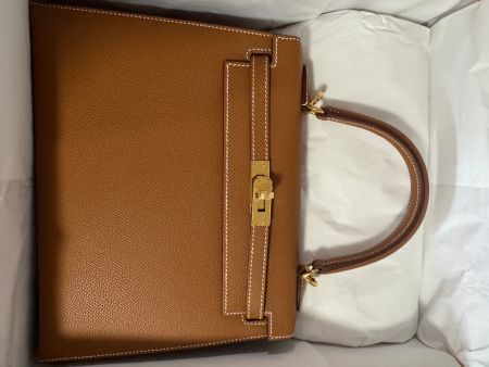 Sac Kelly Hermès 25 , cuir gold, Epsom