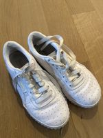 White Puma Sneakers - Trendy and Stylish!
