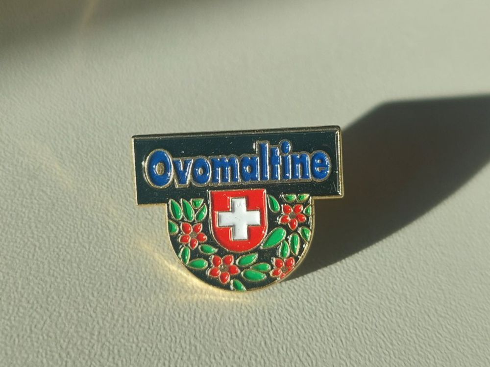 Ovomaltine Plaketten & Abzeichen: Pin Ovomaltine – Gebraucht aus Erlinsbach von pfunky