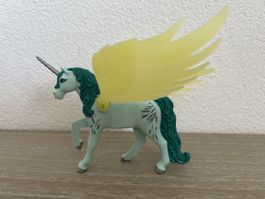 Einhorn Figur hellgrün mit gelben Flügeln guter Zustand