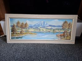 Berglandschaft mit See gerahmt