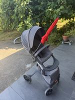 Poussette Stokke Xplory grise avec siège auto bon état