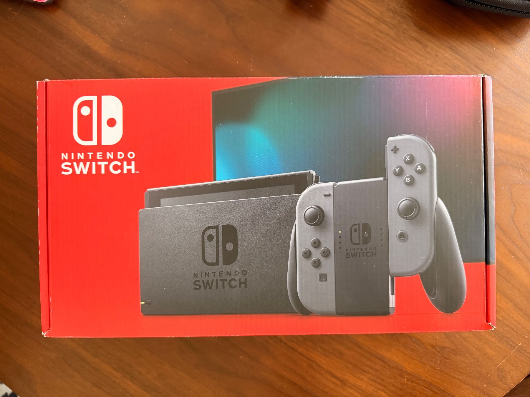 Nintendo Konsolen: Nintendo Switch + 128gb card – Gebraucht aus Lausanne von iam_xzf8