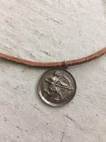 Lederkette mit Anhänger Schütze