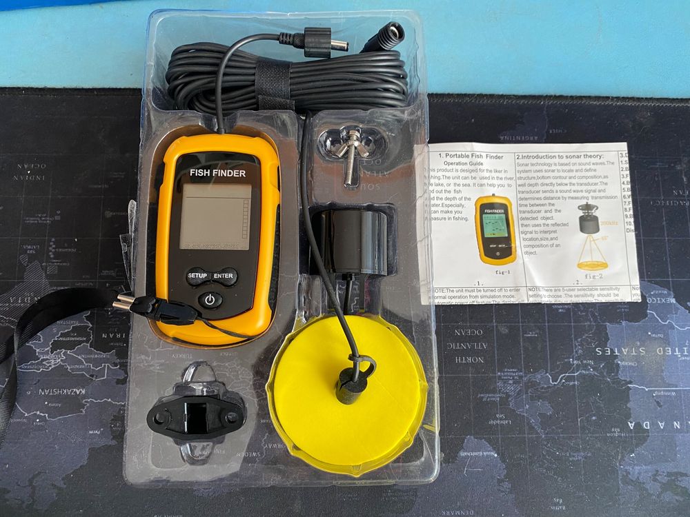 Standard HX230S VHF Marine radio and portable fish finder.