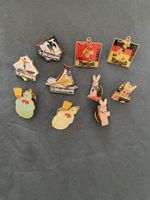 Pins von Bankverein, Duracell und VW/Seat, Pierrot
