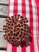 Brosche goldfarben mit roten Schmucksteinen neu