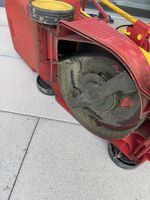 Elektro Rasenmäher Wolf Garten rot gelb 