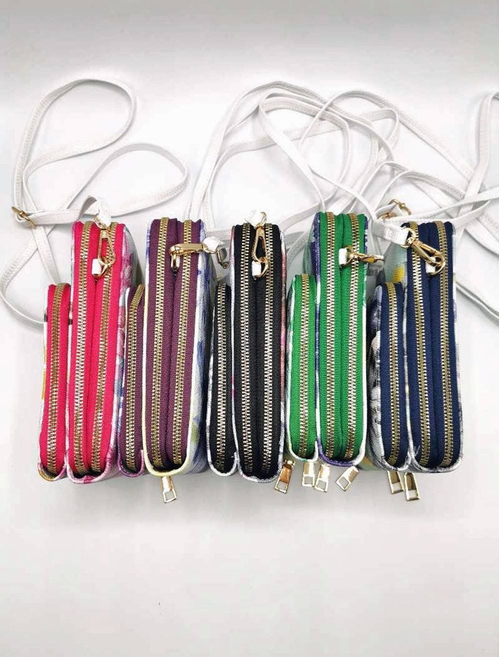 Borse da donna: Handytasche mit Portemonnaie / Farbe Pink – Nuovo e nell'imballaggio originale da Eschenbach SG venduto da Sums 3