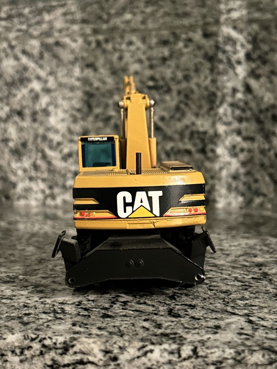 Caterpillar Modellbausätze & Standmodelle: Cat M318, 1:50 , NZG – Gebraucht aus Horw von Tigercat635 1