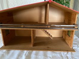 Maison de poupées en bois