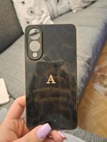 Schwarze Handyhülle mit «A» - Top Zustand!
