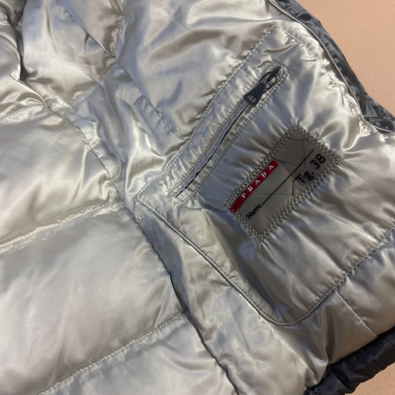 Prada Giacche: Prada vintage nylon down fur-trimmed jacket – Usato da St. Gallen venduto da sourced_limited 6