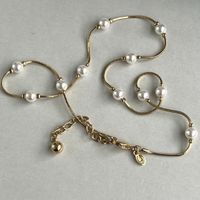 Vintage Designer MONET Faux Pearl Gold Tone Station Necklace