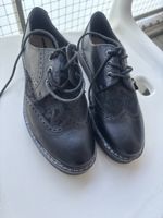 Chaussures plates à lacets