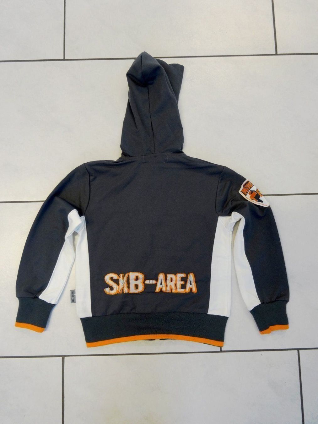 Giacche & Cappotti: Sweat Jacke grau mit Logos Gr. 110/116 – Nuovo e nell'imballaggio originale da Eschenbach SG venduto da Peachick 1