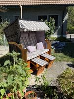 Strandkorb mit Schutzhülle
