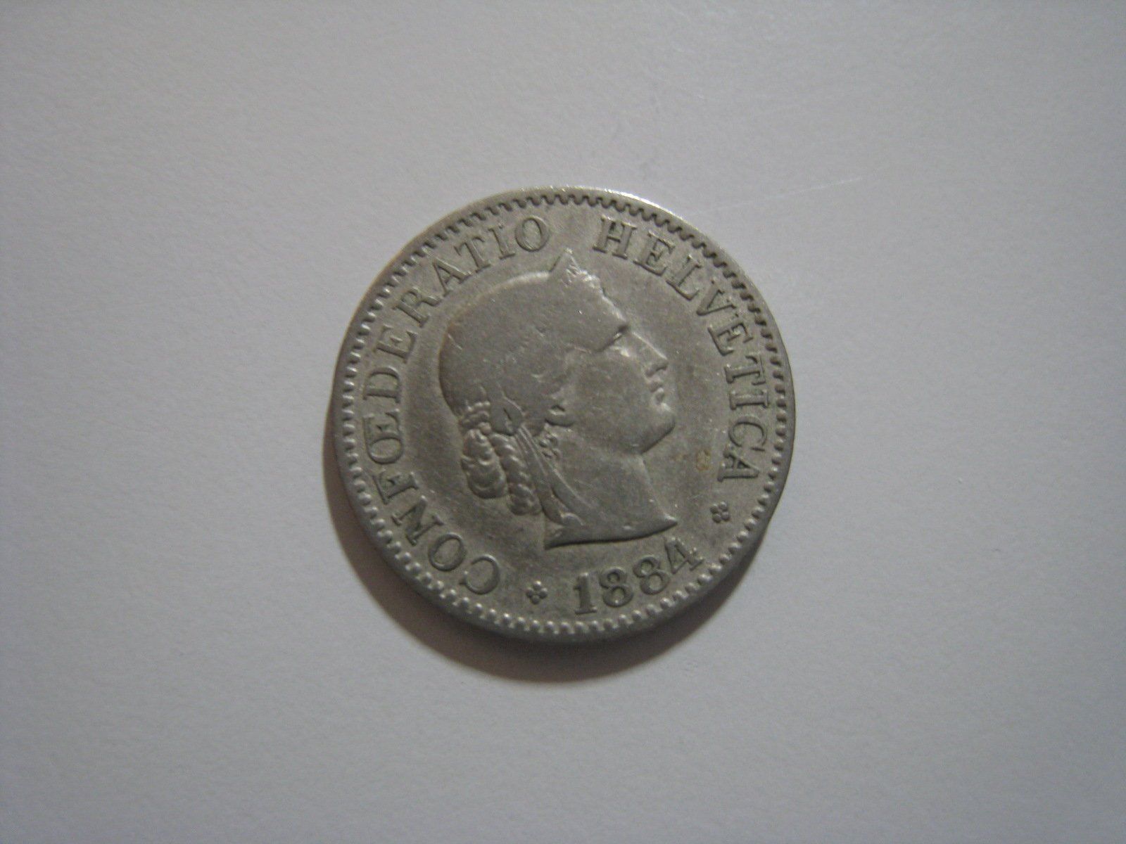 Tutti le monete: 10 Rappen 1884   ss+    (122) – Usato da Aarwangen venduto da Pinsel7890